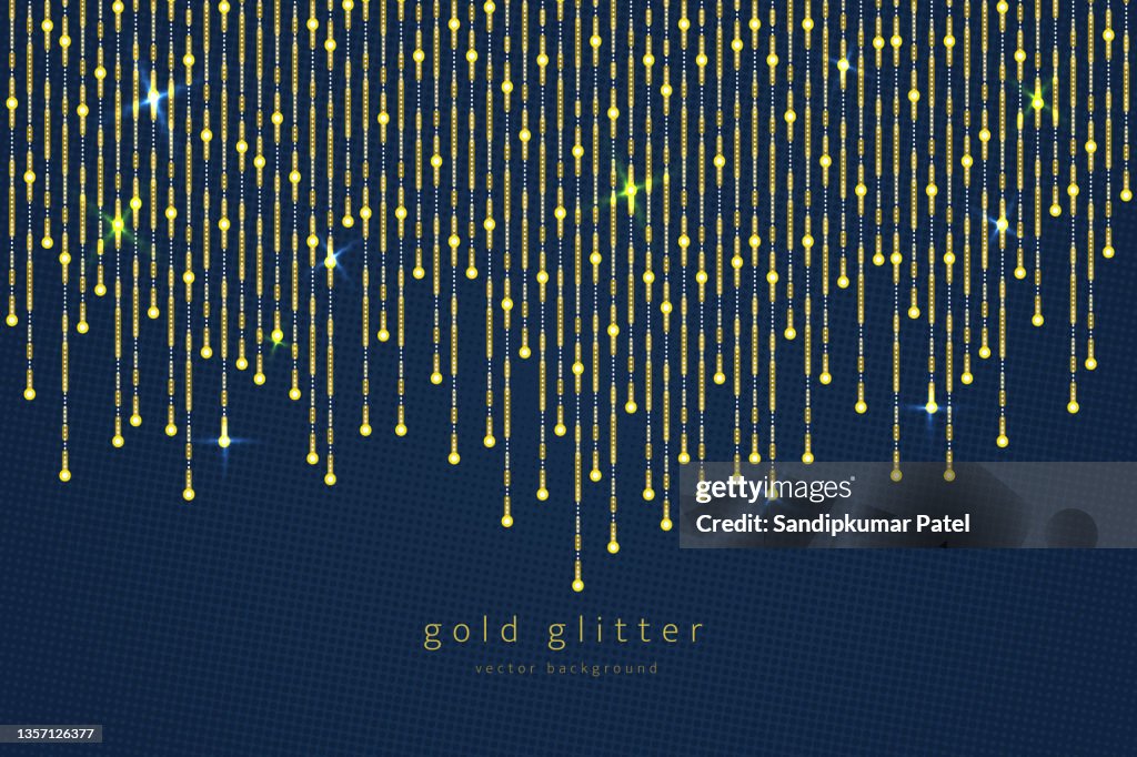 Curtain of golden particles on a blue background