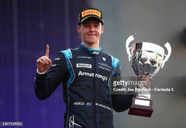 Race winner Marcus Armstrong of New Zealand and DAMS celebrates on the podium during sprint race 1 of Round 7:Jeddah of the Formula 2 Championship at...