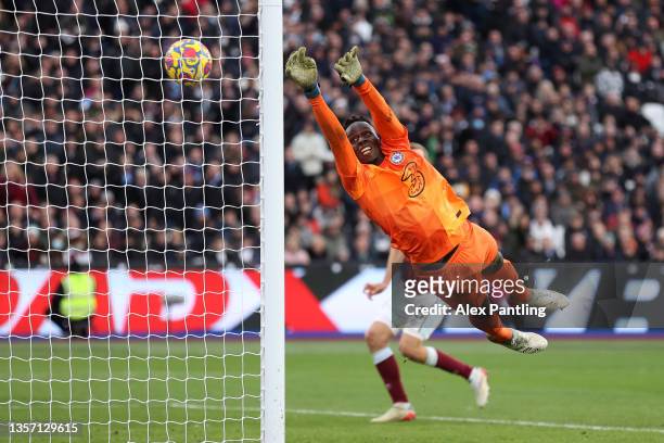 Edouard Mendy of Chelsea fails to save a shot from Arthur Masuaku of West Ham United , which leads to West Ham United's third goal during the Premier...