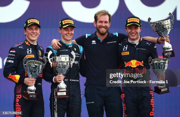 Race winner Marcus Armstrong of New Zealand and DAMS, second placed Liam Lawson of New Zealand and Hitech Grand Prix, and third placed Juri Vips of...