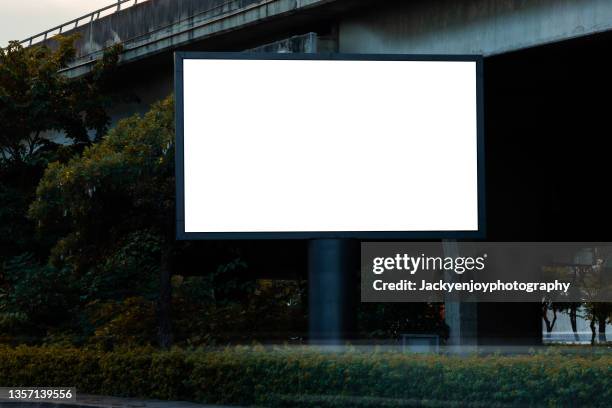 blank billboard on city street. outdoor advertising - composizione orizzontale foto e immagini stock