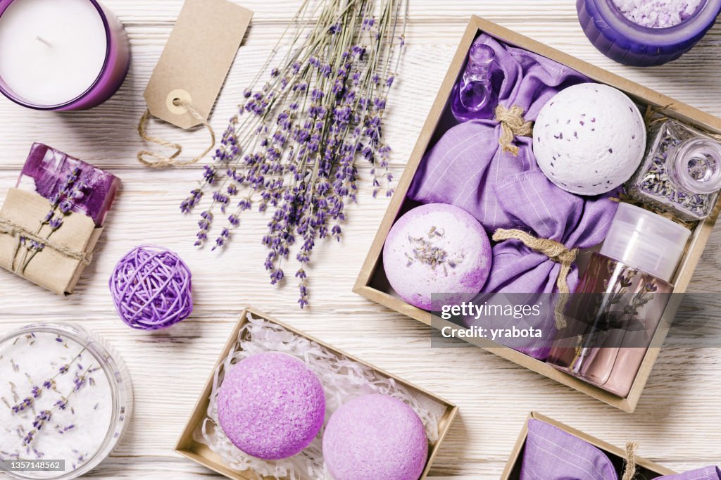 Lavender bath bombs, sea salt, sachets, aromatherapy sleep spray, fragrant and healthy spa products with lavender essential oil. Herbal medicine concept, cosmetic for body treatment