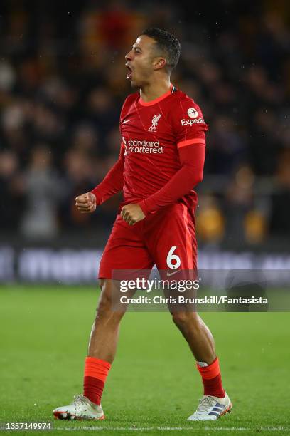Thiago Alcantara of Liverpool celebrates at full-time following the Premier League match between Wolverhampton Wanderers and Liverpool at Molineux on...