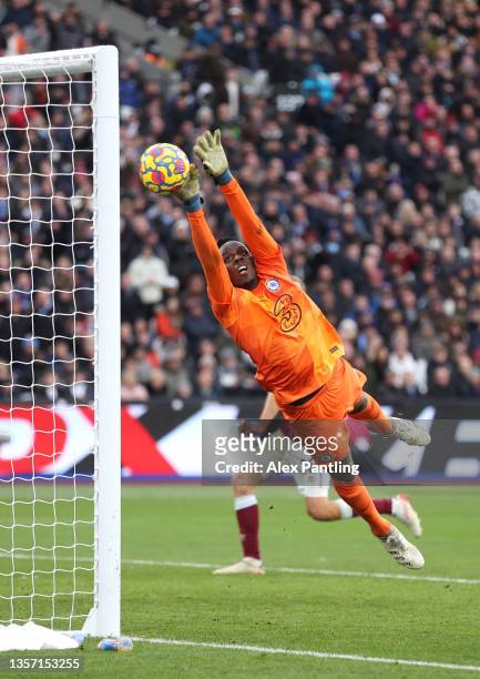 Edouard Mendy of Chelsea fails to stop West Ham's third goal scored by Arthur Masuaku during the Premier League match between West Ham United and...