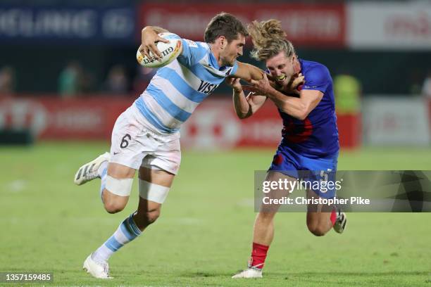 Santiago Alvarez of Argentina and Stephen Parez of France battle for position during the Men’s Cup Bronze Medal Final match between Argentina and...