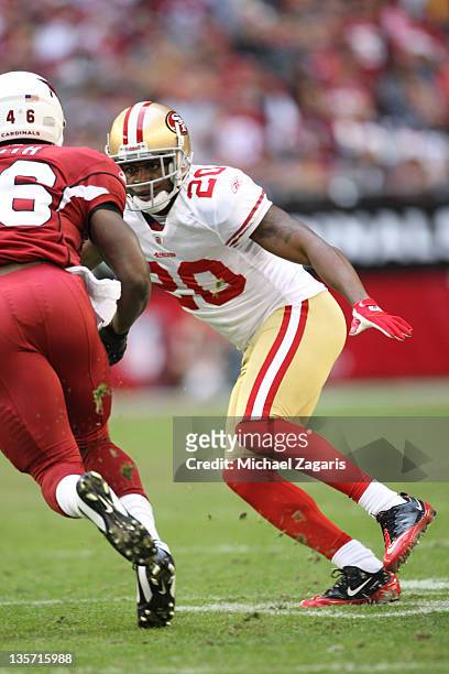 Madieu Williams of the San Francisco 49ers defends during the game against the Arizona Cardinals at the University of Phoenix Stadium on December 11,...