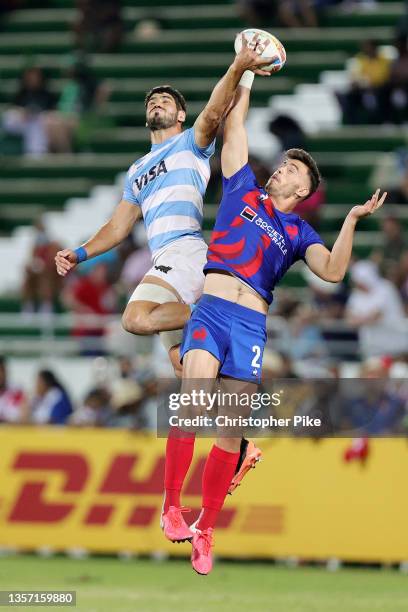 German Schulz of Argentina and Ethan Dumortier of France compete for the ball during the Men’s Cup Bronze Medal Final match between Argentina and...