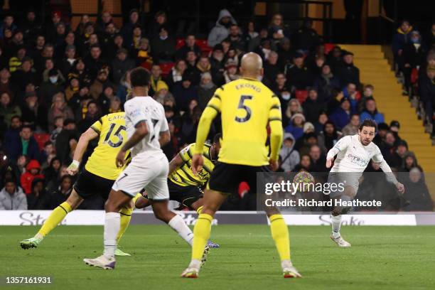 Bernardo Silva of Manchester City scores their side's third goal during the Premier League match between Watford and Manchester City at Vicarage Road...