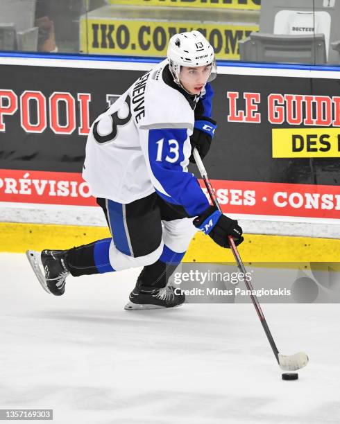 William Villeneuve of the Saint John Sea Dogs skates the puck against the Blainville-Boisbriand Armada during the second period at Centre...