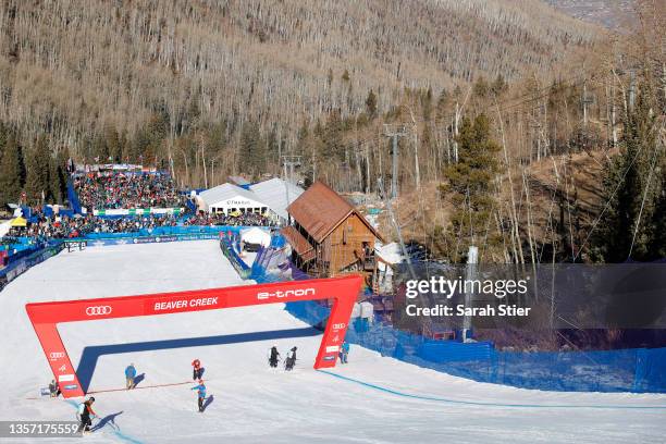 General view of the finish line as course workers perform maintenance prior to the Men's Downhill event during the Audi FIS Alpine Ski World Cup at...