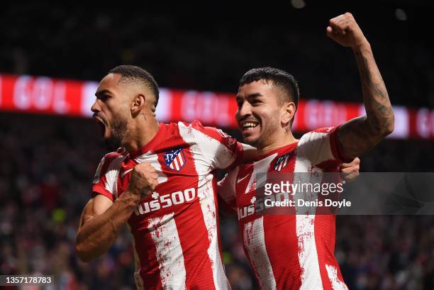 Matheus Cunha of Club Atletico de Madrid celebrates with Angel Correa after scoring their side's first goal during the La Liga Santander match...