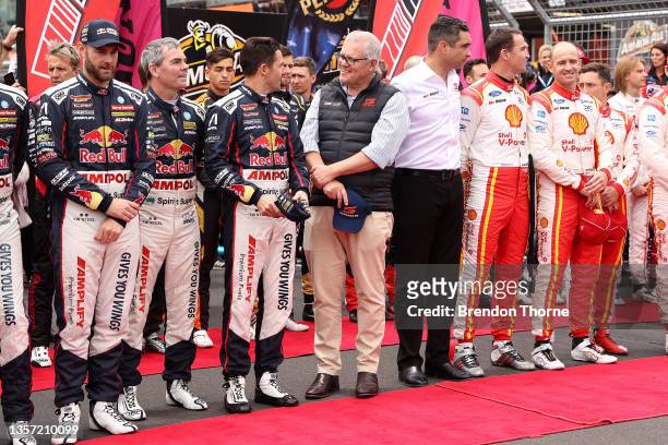 Jamie Whincup driver of the Red Bull Ampol Racing Holden Commodore ZB and Australian Prime Minister Scott Morrison are seen before the Bathurst 1000...