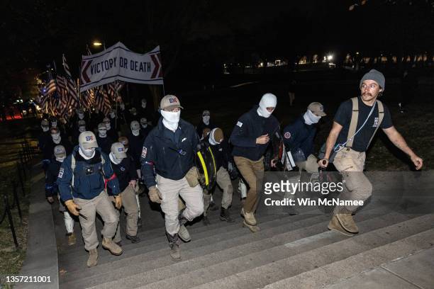Members of the rightwing group Patriot Front march along the National Mall near the Lincoln Memorial on December 04, 2021 in Washington, DC. Patriot...