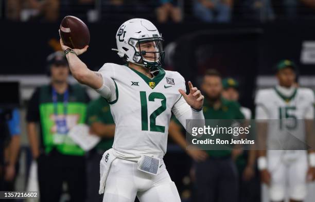 Blake Shapen of the Baylor Bears looks to throw against the Oklahoma State Cowboys in the first half of the Big 12 Football Championship at AT&T...