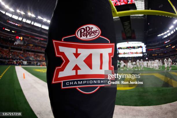 The Big 12 logo is seen on a goal post before the game between the Oklahoma State Cowboys and the Baylor Bears in the Big 12 Football Championship at...