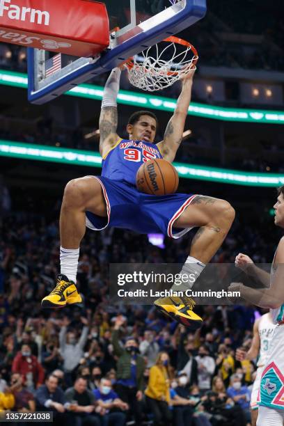 Juan Toscano-Anderson of the Golden State Warriors dunks the ball against the San Antonio Spurs in the fourth quarter at Chase Center on December 04,...