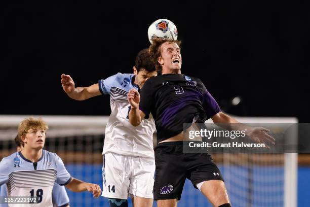 Laurens ten Cate of the Amherst Mammoths battles Augie Djerdjaj of the Connecticut College Camels for a header during the Division III Men’s Soccer...