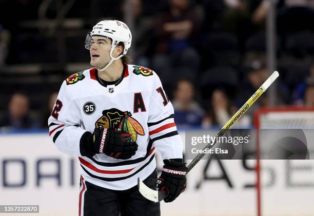 Alex DeBrincat of the Chicago Blackhawks celebrates his goal in the third period against the New York Rangers at Madison Square Garden on December...