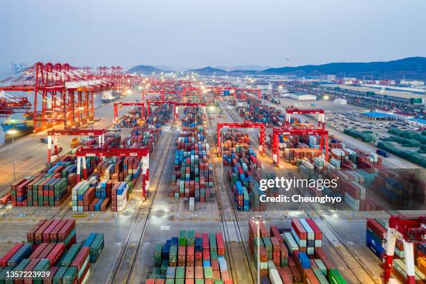 drone aerial view of the qianwan port container terminal in qingdao, east china's shandong province - shipyard stock pictures, royalty-free photos & images