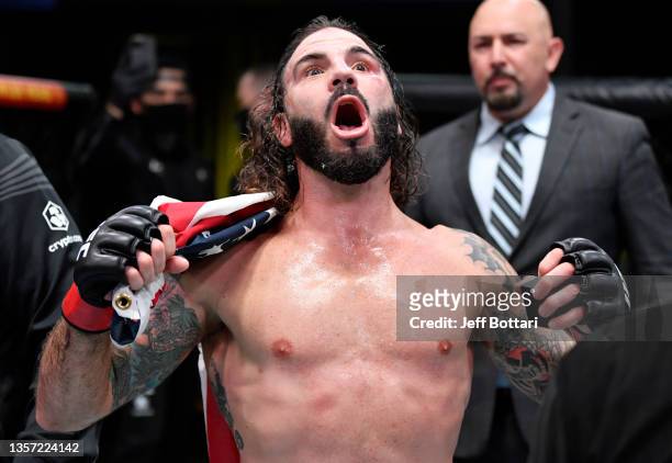 Clay Guida reacts after his submission victory over Leonardo Santos of Brazil in their lightweight fight during the UFC Fight Night event at UFC APEX...