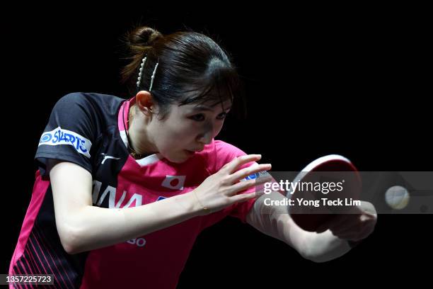 Hina Hayata of Japan plays a backhand against Cheng I-Ching of Chinese Taipei during their Women's Singles Round of 16 match on day two of the WTT...