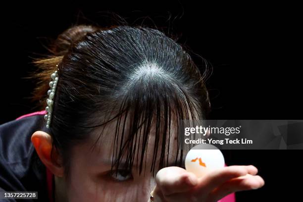 Hina Hayata of Japan serves against Cheng I-Ching of Chinese Taipei during their Women's Singles Round of 16 match on day two of the WTT Cup Finals...