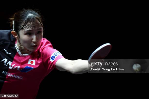 Hina Hayata of Japan plays a backhand against Cheng I-Ching of Chinese Taipei during their Women's Singles Round of 16 match on day two of the WTT...