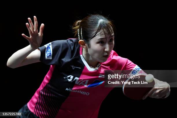 Hina Hayata of Japan plays a backhand against Cheng I-Ching of Chinese Taipei during their Women's Singles Round of 16 match on day two of the WTT...