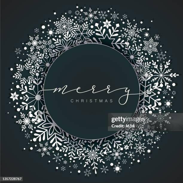 christmas greeting over a snowflake wreath - christmas wreath stock illustrations