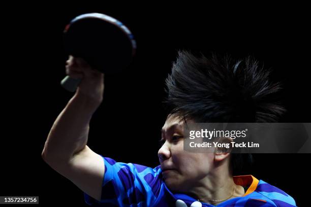 Cheng I-Ching of Chinese Taipei plays a forehand against Hina Hayata of Japan during their Women's Singles Round of 16 match on day two of the WTT...
