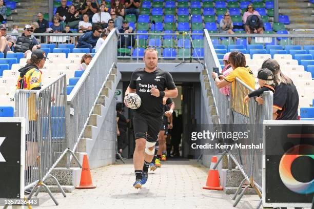 Nick Strachan of the Heartland XV leads out the team for the Heartland XV v New Zealand Barbarians match at Owen Delany Park on December 05 in Taupo,...