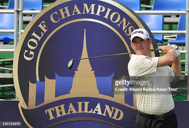 Lee Westwood of England plays a shot during his practice round of the Thailand Golf Championship at Amata Spring Country Club on December 13, 2011 in...