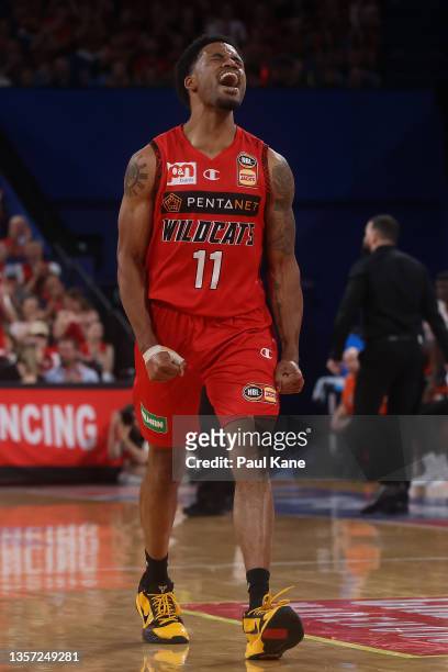 Bryce Cotton of the Wildcats celebrates a 3 point shot during the round one NBL match between the Perth Wildcats and Cairns Taipans at RAC Arena on...