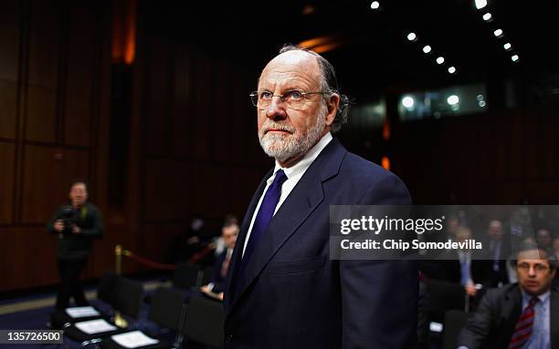 Former MF Global Chairman and CEO Jon Corzine prepares to testify before the Senate Agriculture, Nutrition and Forestry Committee about the demise...