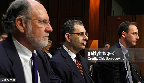 Former MF Global Chairman and CEO Jon Corzine, former President and COO Bradley Abelow and former CFO Henri Steenkamp testify before the Senate...