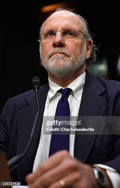 Former MF Global Chairman and CEO Jon Corzine prepares to testify before the Senate Agriculture, Nutrition and Forestry Committee about the demise...