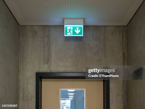 Exit Sign Building 36 Exit Sign Hanging From Ceiling Stock Photos, High-Res Pictures, and ...