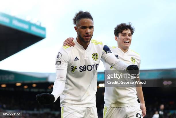 Tyler Roberts of Leeds United celebrates with Daniel James after scoring their side's first goal during the Premier League match between Leeds United...