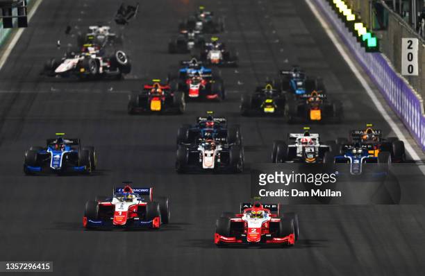 Oscar Piastri of Australia and Prema Racing leads Robert Shwartzman of Russia and Prema Racing and the rest of the field at the start during the...