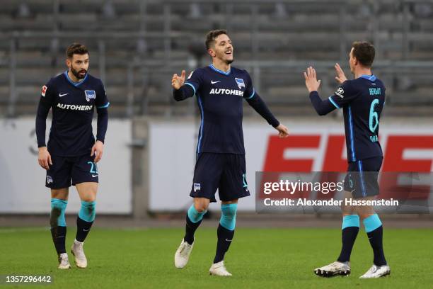 Stevan Jovetic of Hertha Berlin celebrates after scoring their sides first goal with team mate Vladimir Darida during the Bundesliga match between...