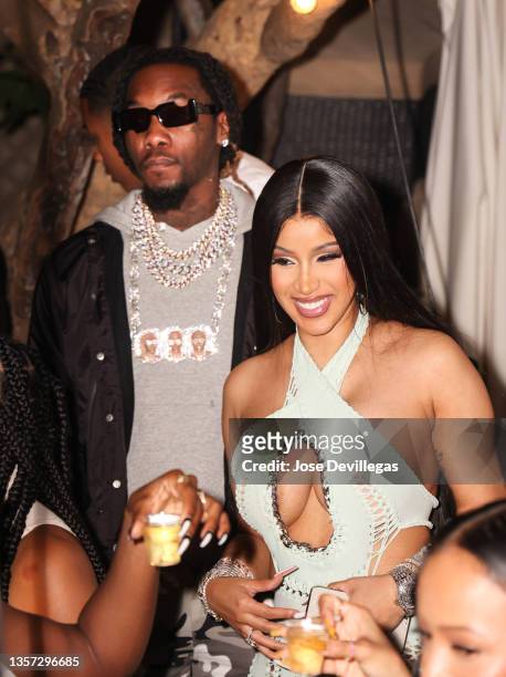 Offset and Cardi B seen attending Maxim Issue Release Party at Hyde Beach at SLS South Beach on December 04, 2021 in Miami Beach, Florida.