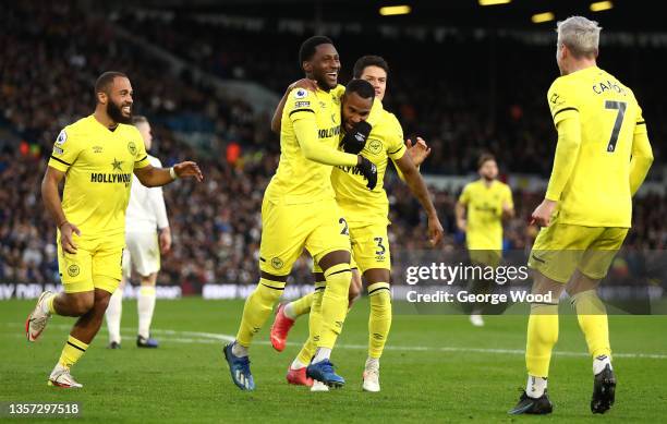 Shandon Baptiste of Brentford celebrates after scoring their side's first goal with Rico Henry during the Premier League match between Leeds United...