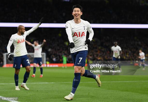 Heung-Min Son of Tottenham Hotspur celebrates after scoring their sides third goal during the Premier League match between Tottenham Hotspur and...