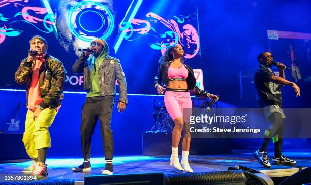 Taboo, will.i.am, J. Rey Soul and apl.de.ap of Black Eyed Peas perform at the 99.7 NOW Presents POPTOPIA radio show at SAP Center on December 04,...