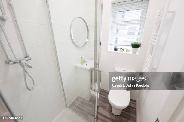 property interiors - toilet bowl bathroom stock pictures, royalty-free photos & images