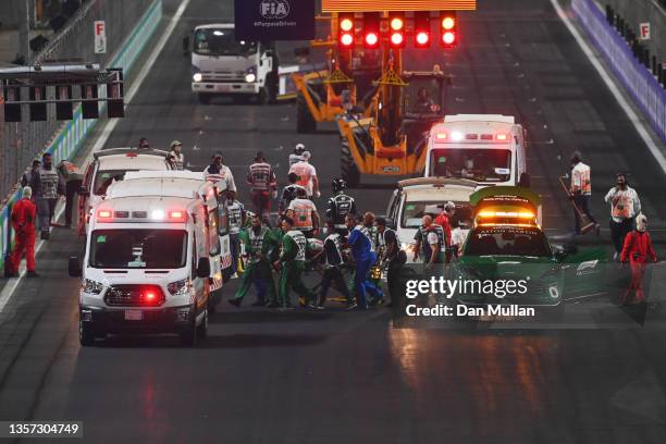 Theo Pourchaire of France and ART Grand Prix and Enzo Fittipaldi of Brazil and Charouz Racing System receive medical treatment after a crash at the...