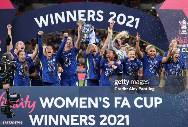 Magdalena Eriksson and Millie Bright of Chelsea lift The Vitality Women's FA Cup trophy following their side's victory during the Vitality Women's FA...