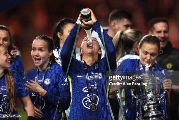 Sam Kerr of Chelsea drinks from a winners bottle as Chelsea celebrate victory during the Vitality Women's FA Cup Final between Arsenal FC and Chelsea...