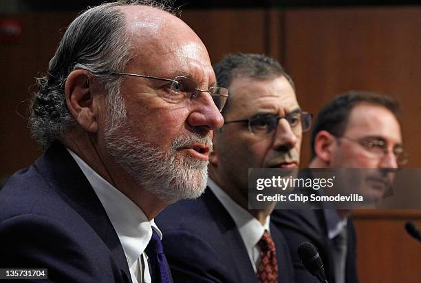 Former MF Global Chairman and CEO Jon Corzine, former President and COO Bradley Abelow and former CFO Henri Steenkamp testify before the Senate...