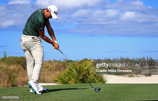 Collin Morikawa of the United States hits his tee shot on the third hole during the final round of the Hero World Challenge at Albany Golf Course on...